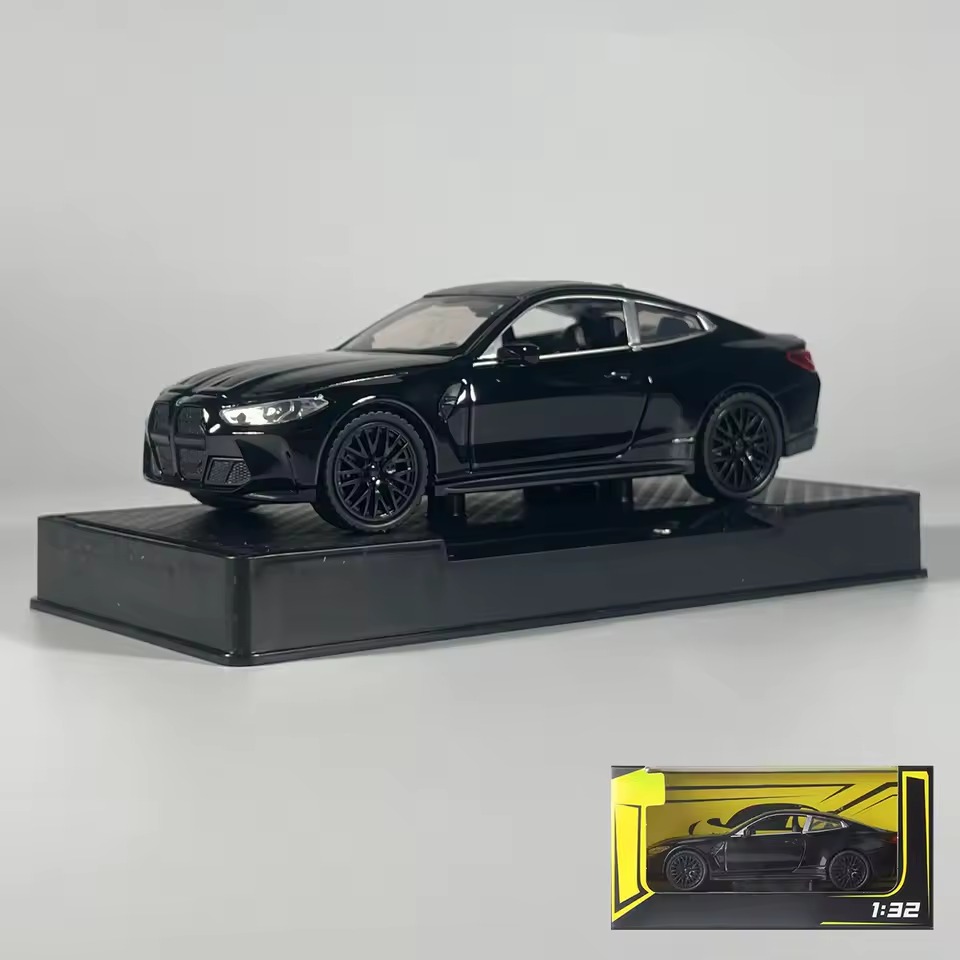 Black BMW M4 model in display box