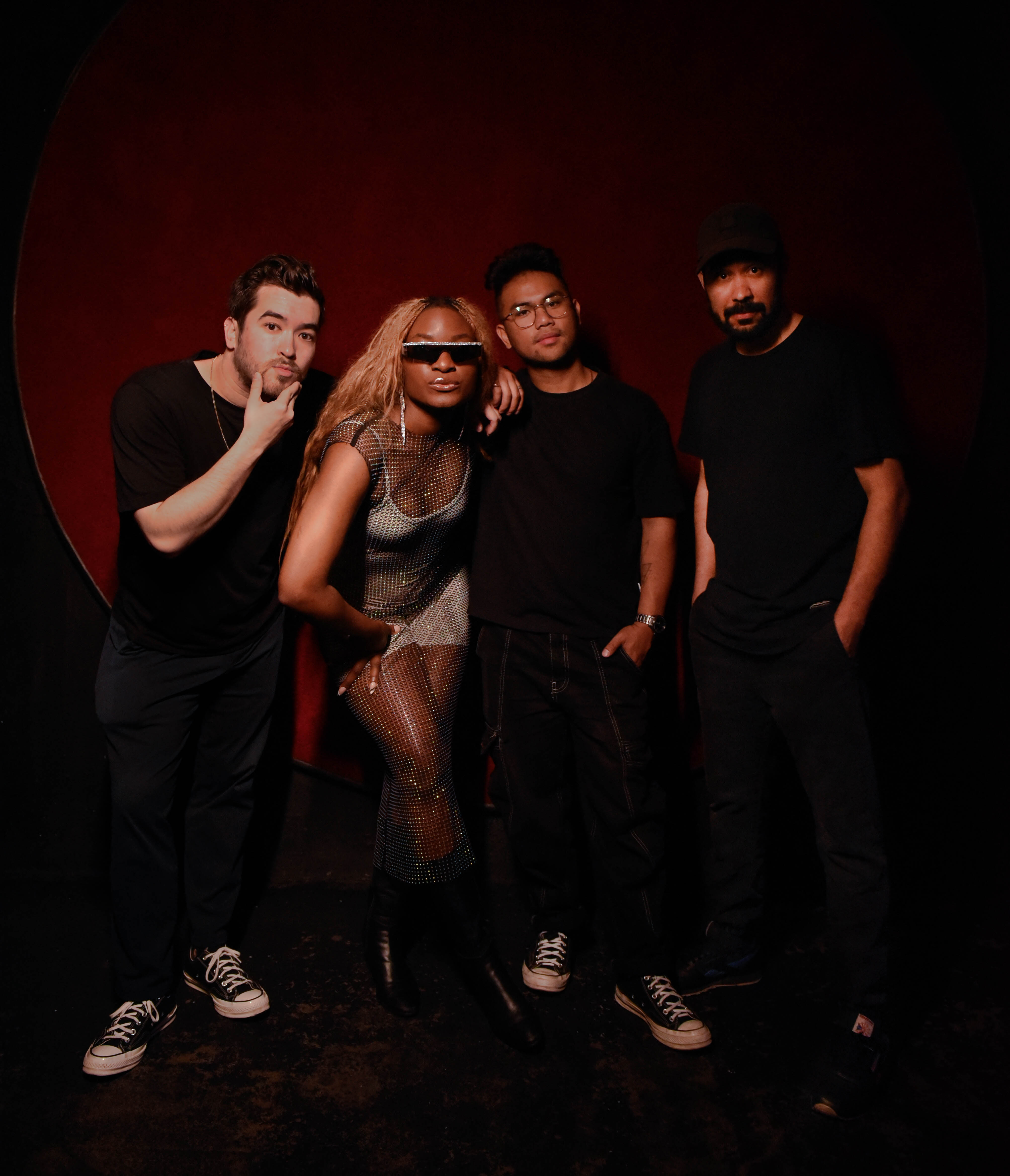 Sadé with band members