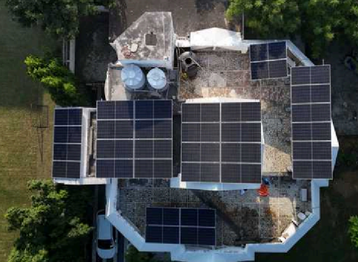 Aerial view of a Solarise project rooftop with multiple solar panel clusters, annotated across the three phases of the Solarise process