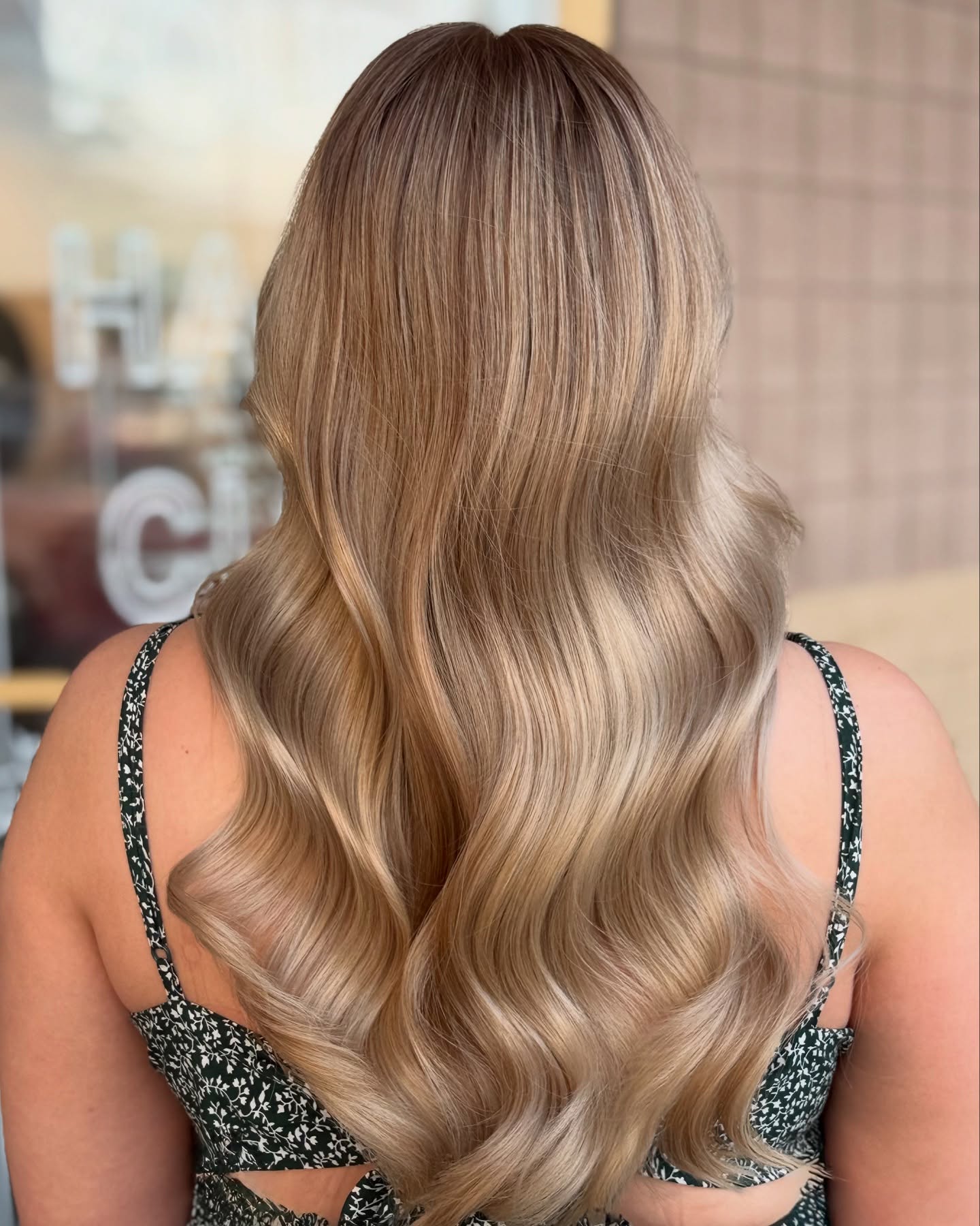 Blonde balayage back view — The Hair Co. Salon