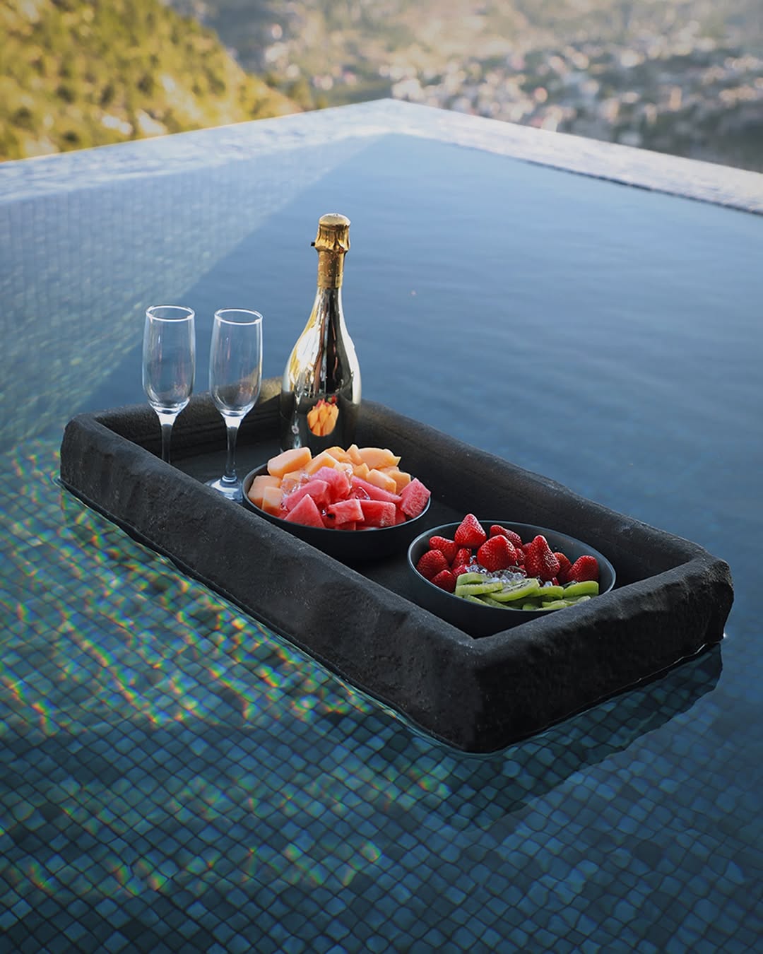 In-pool champagne and fruit service at Minus7 infinity pool