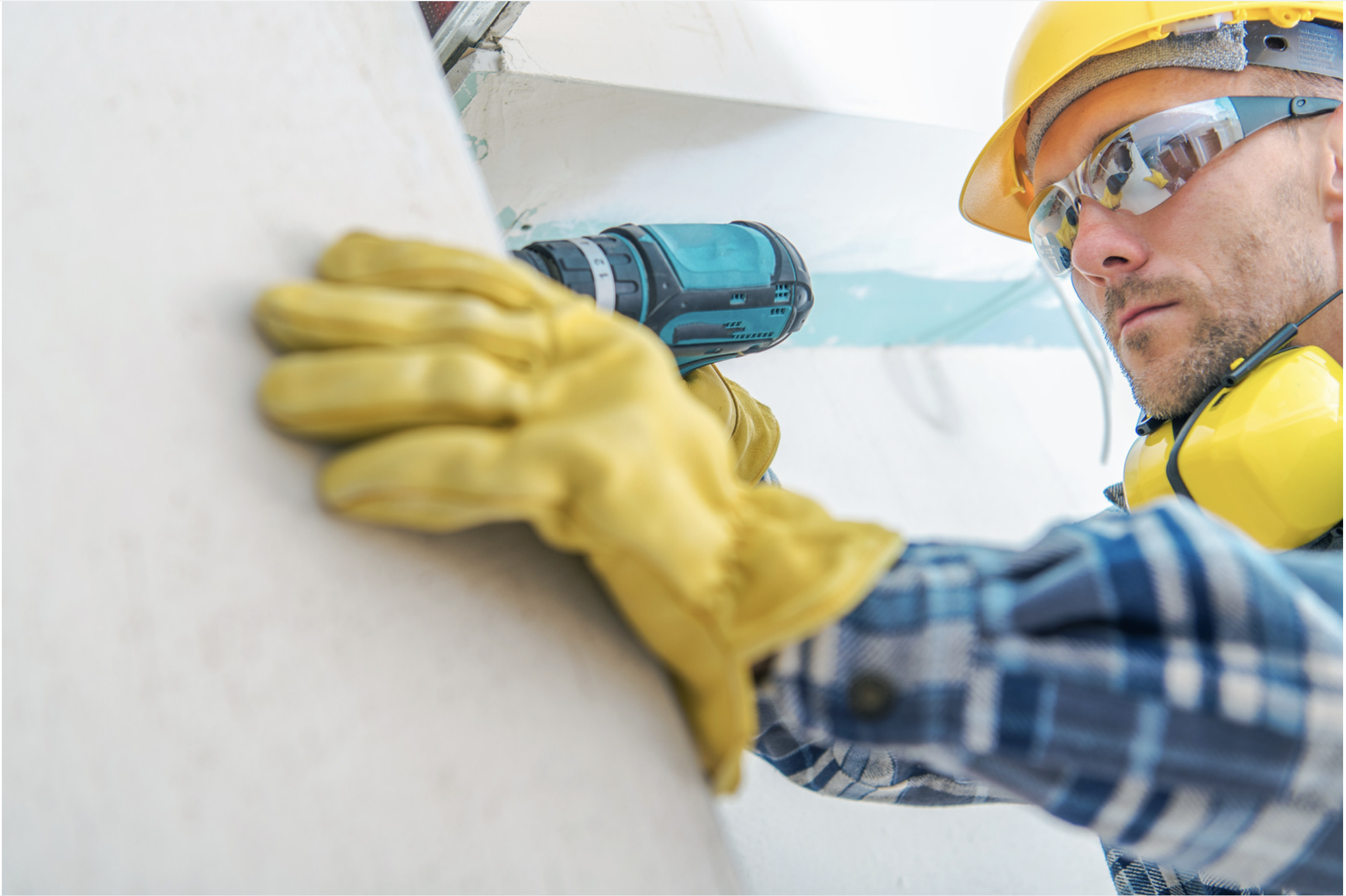 Professional contractor using a power drill