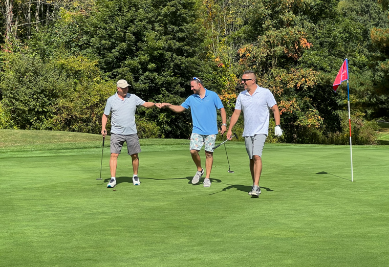 Fist Bump on the Green