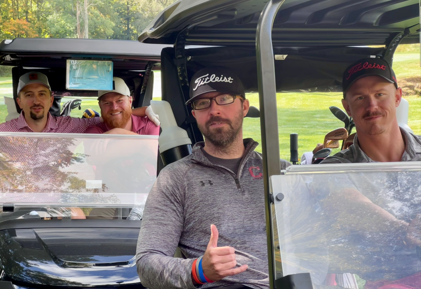Golfers in Cart