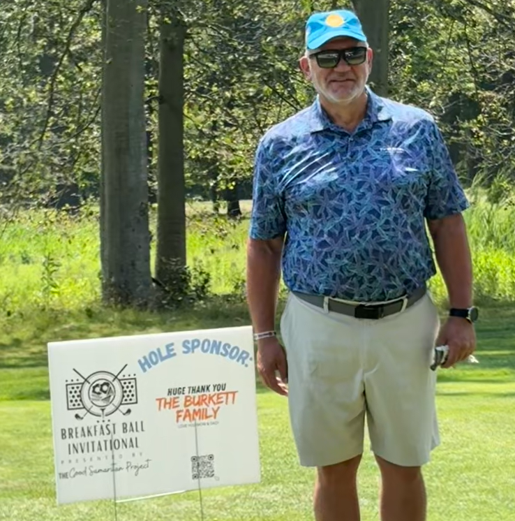 Golfer at Burkett Family Hole Sponsor