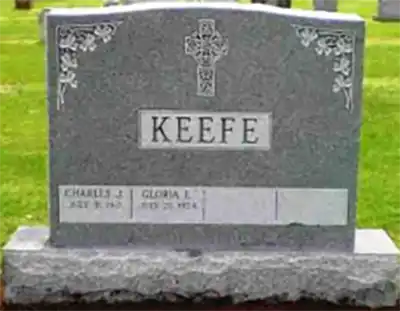 ZELLNER headstone with floral carving