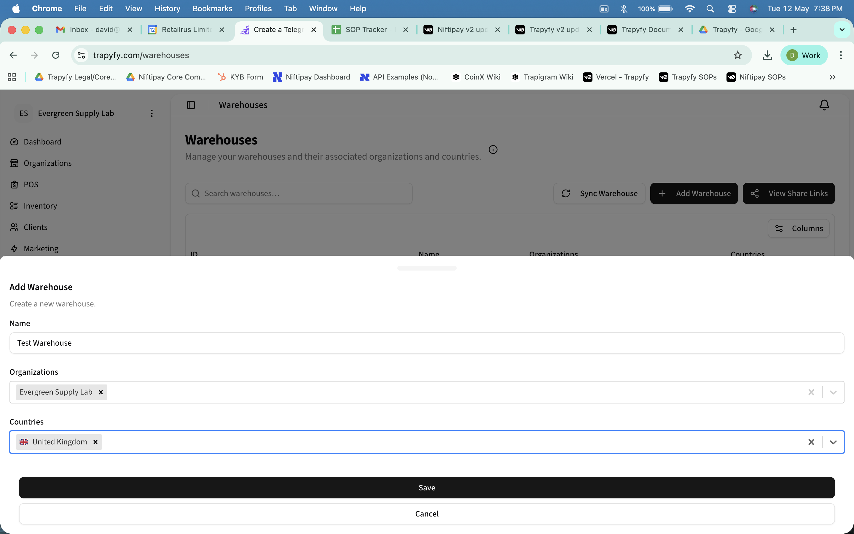 Add Warehouse form showing Name field with 'Test Warehouse', Organisations field with 'Evergreen Supply Lab', Countries field with 'United Kingdom' selected, and Save and Cancel buttons