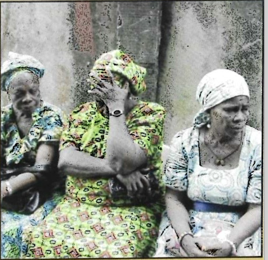 Elderly widows seated together during the visit