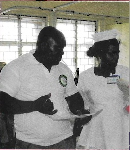 KUTH team and hospital staff with donated wheelchairs