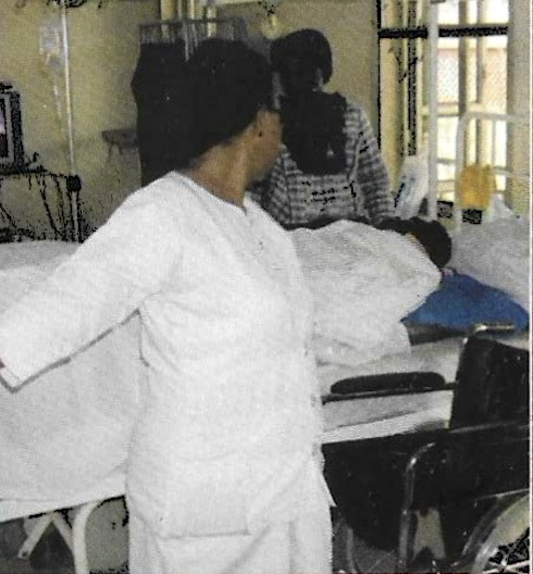 Nurse positioning wheelchair for patient