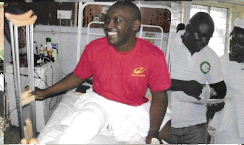 Happy patient with volunteer after receiving crutches