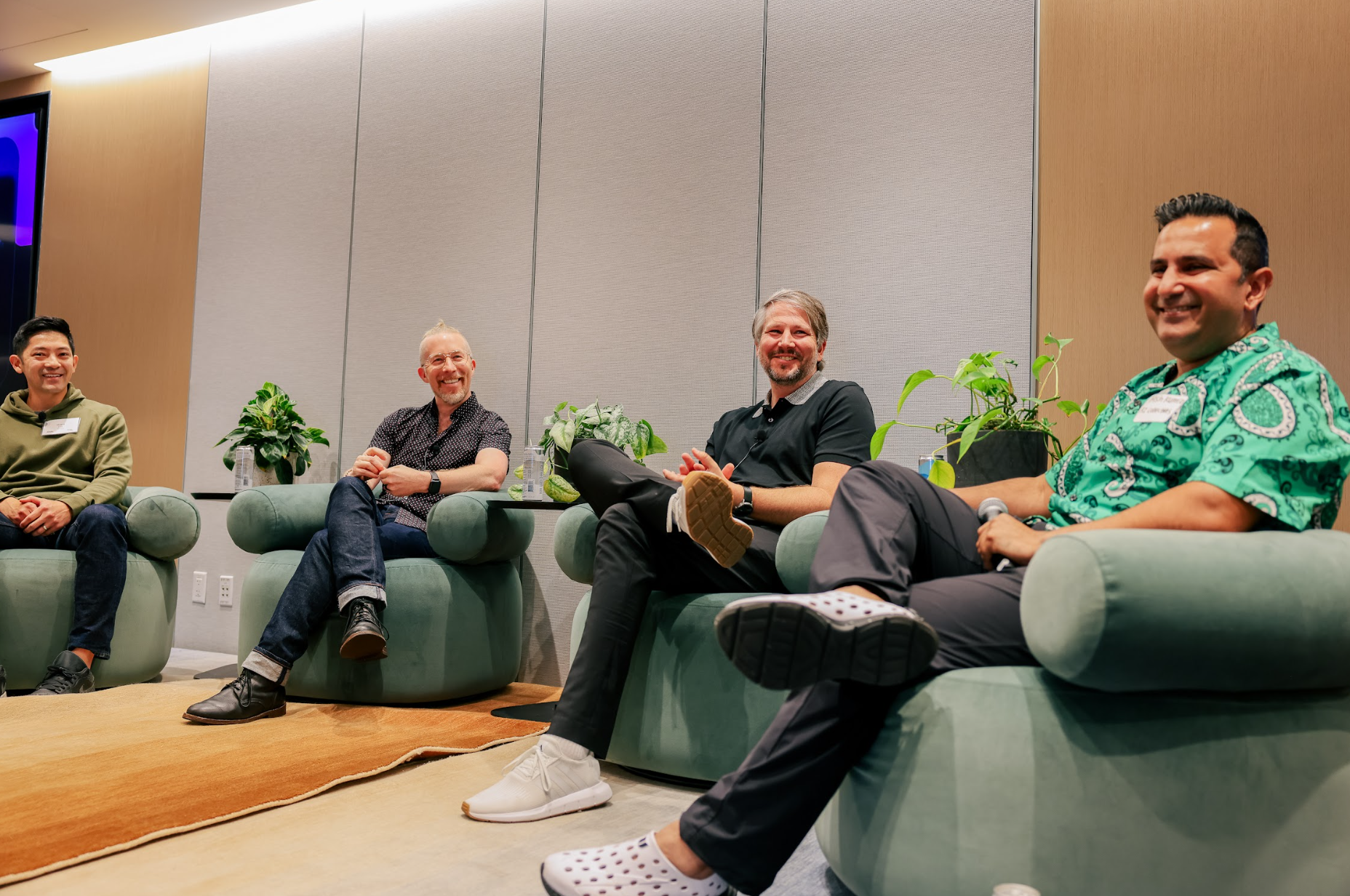 Panel of four speakers
