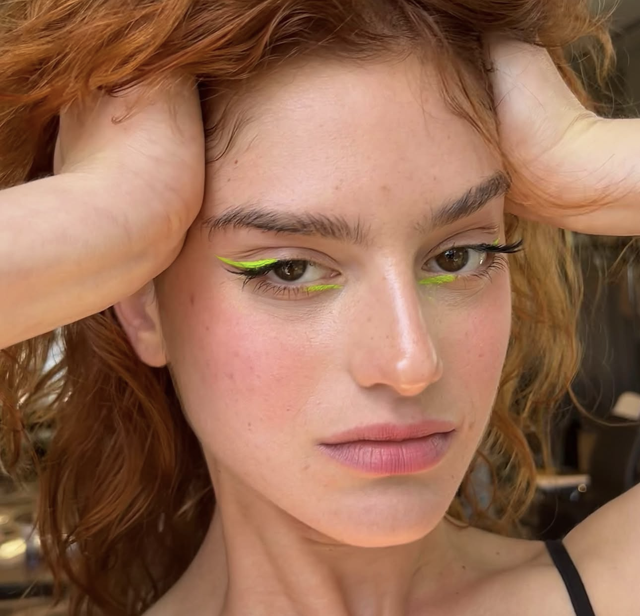 Close-up of a colourful graphic eyeliner look