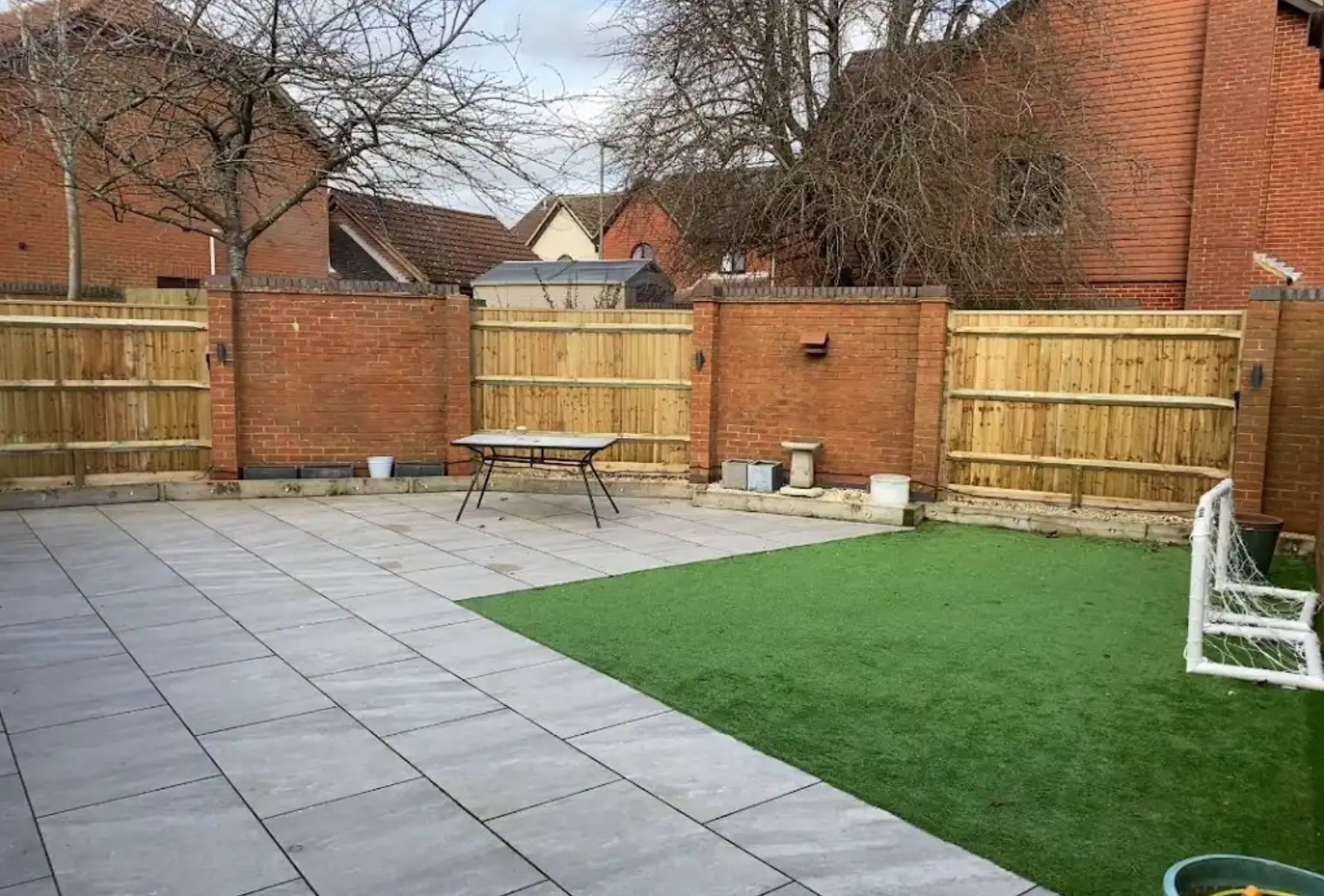 Close-Board Panels with Brick Piers
