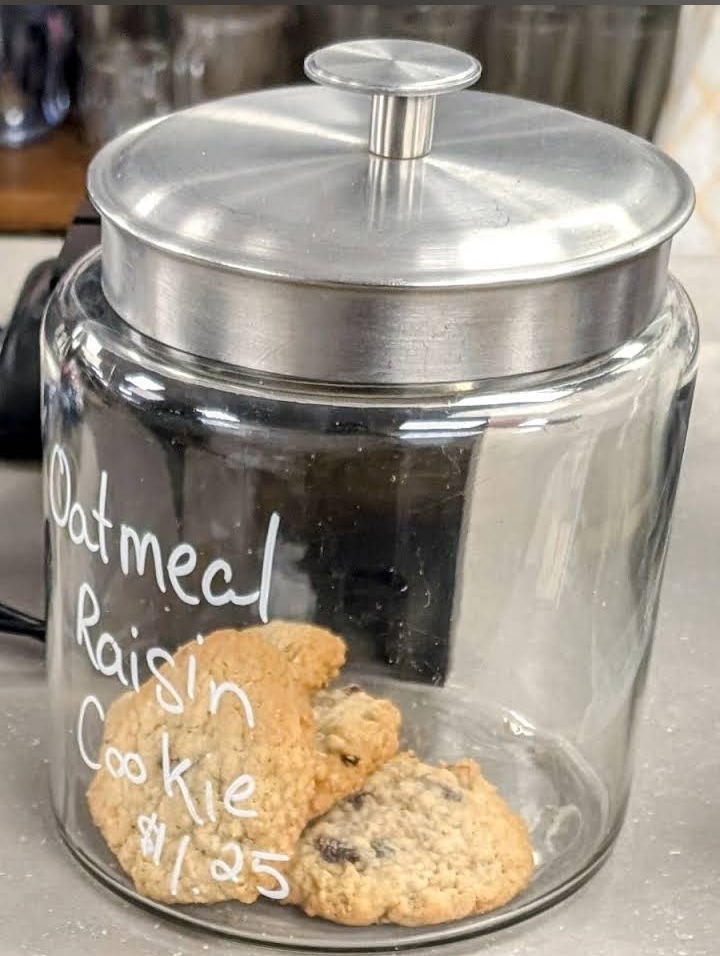 Oatmeal raisin cookies in a glass jar