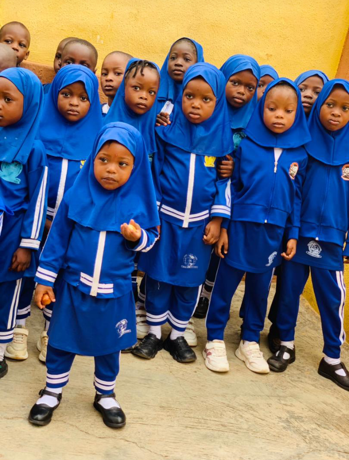 Female students in blue hijab uniforms