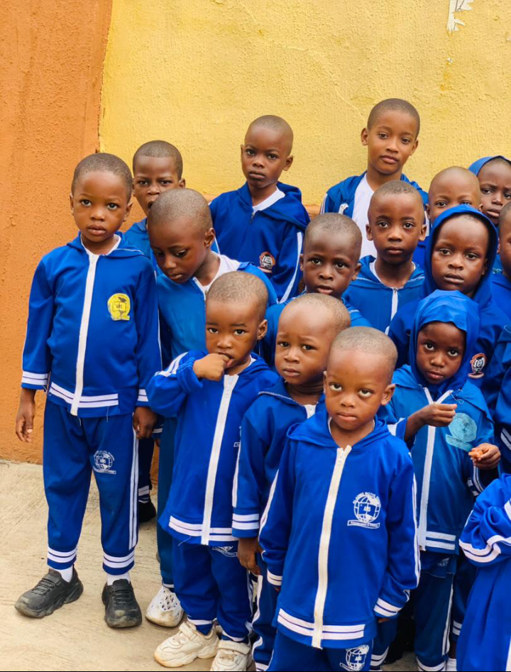 Students in blue tracksuits