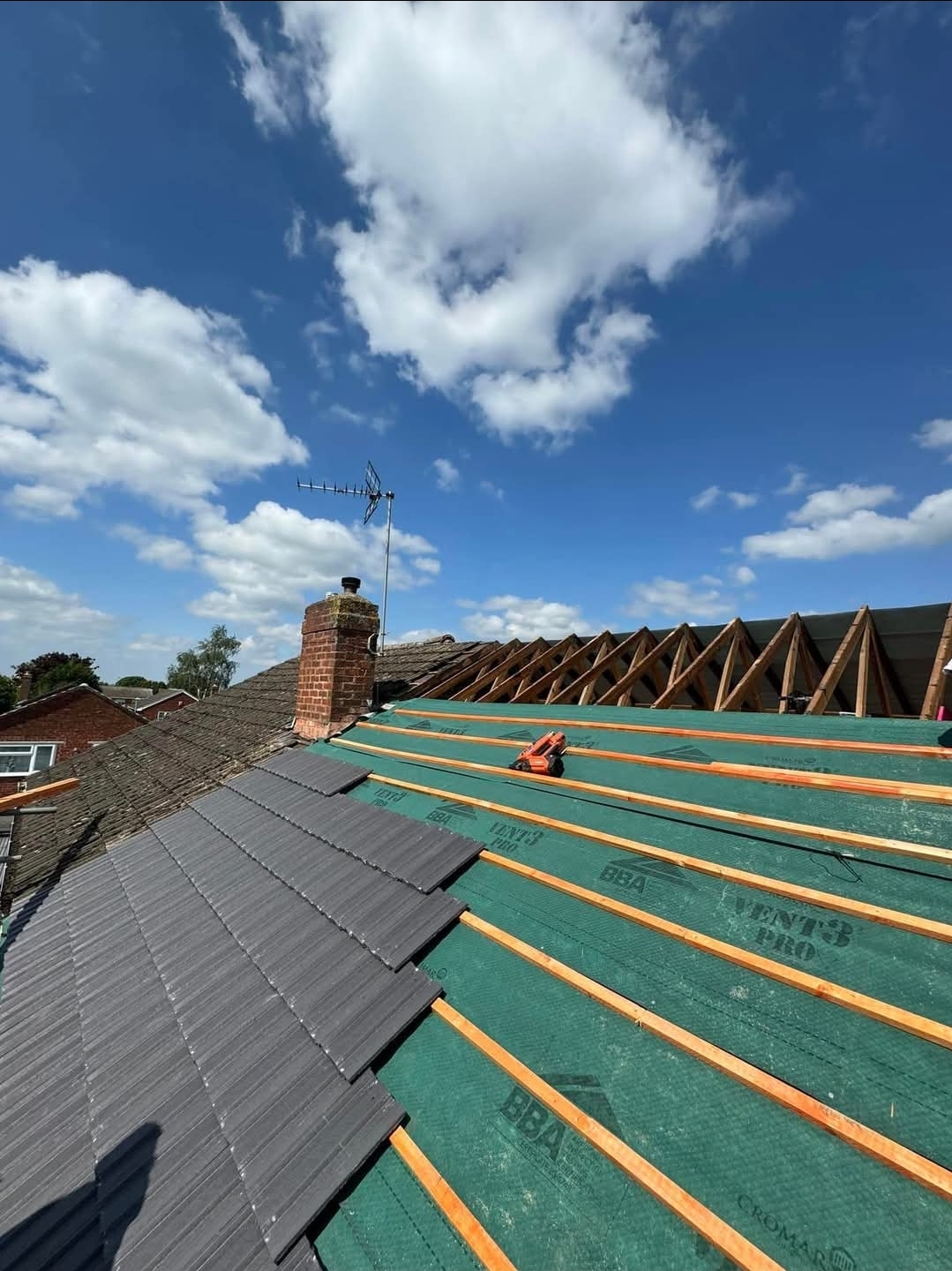 Professional roofers in Edinburgh working on new roof installation
