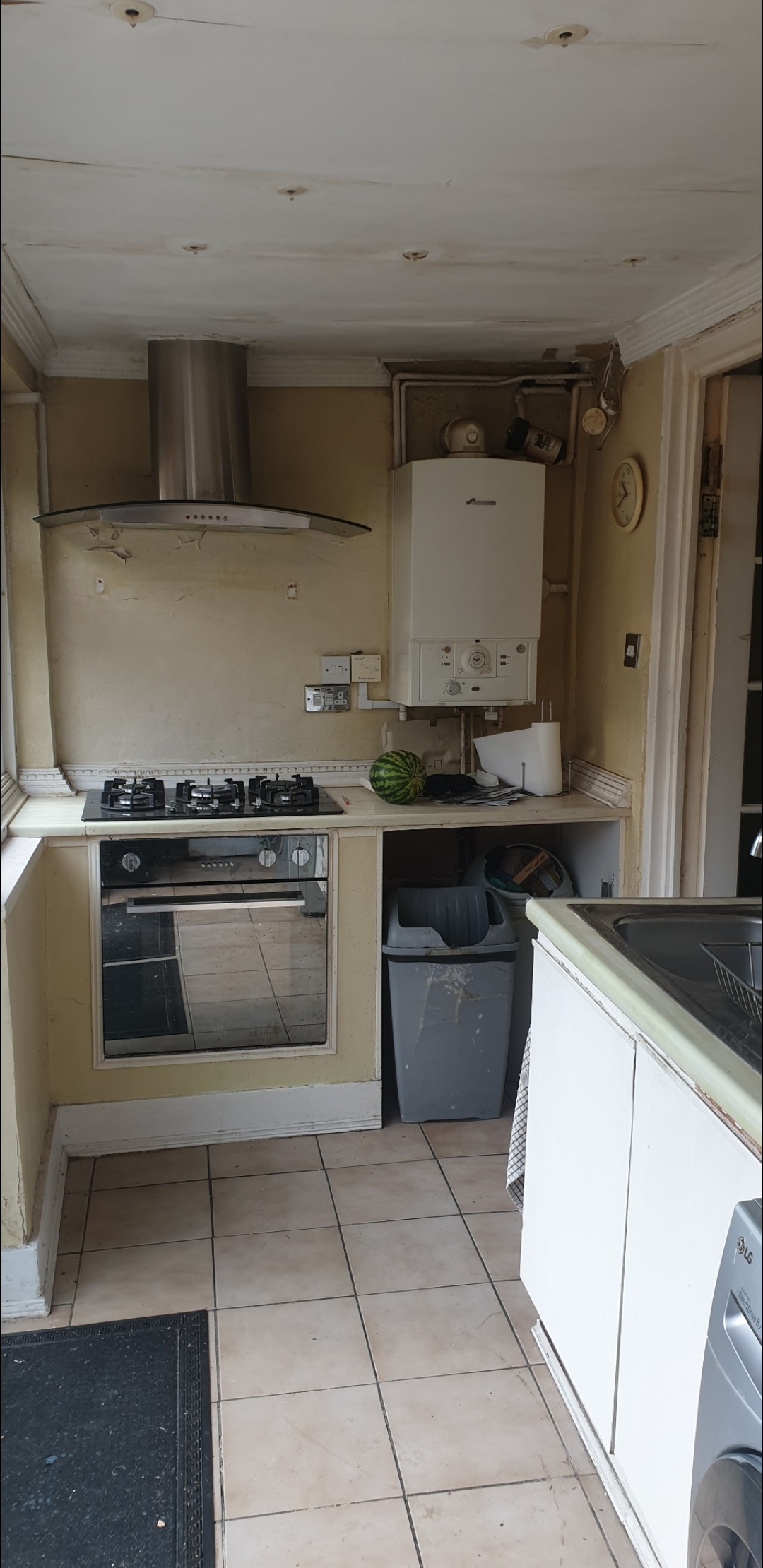 Kitchen mid-progress - appliances and plumbing installation