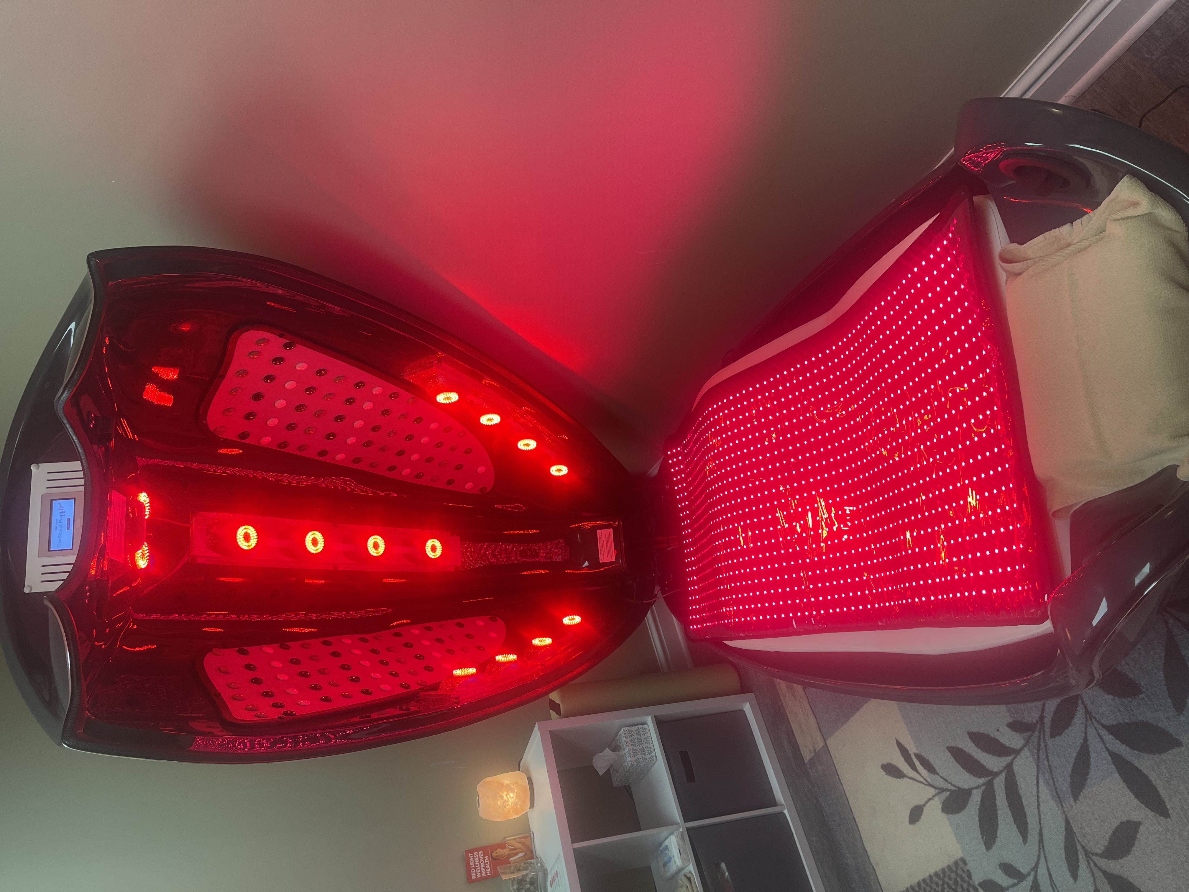 The Sculpt Pod body contouring device with red light therapy activated