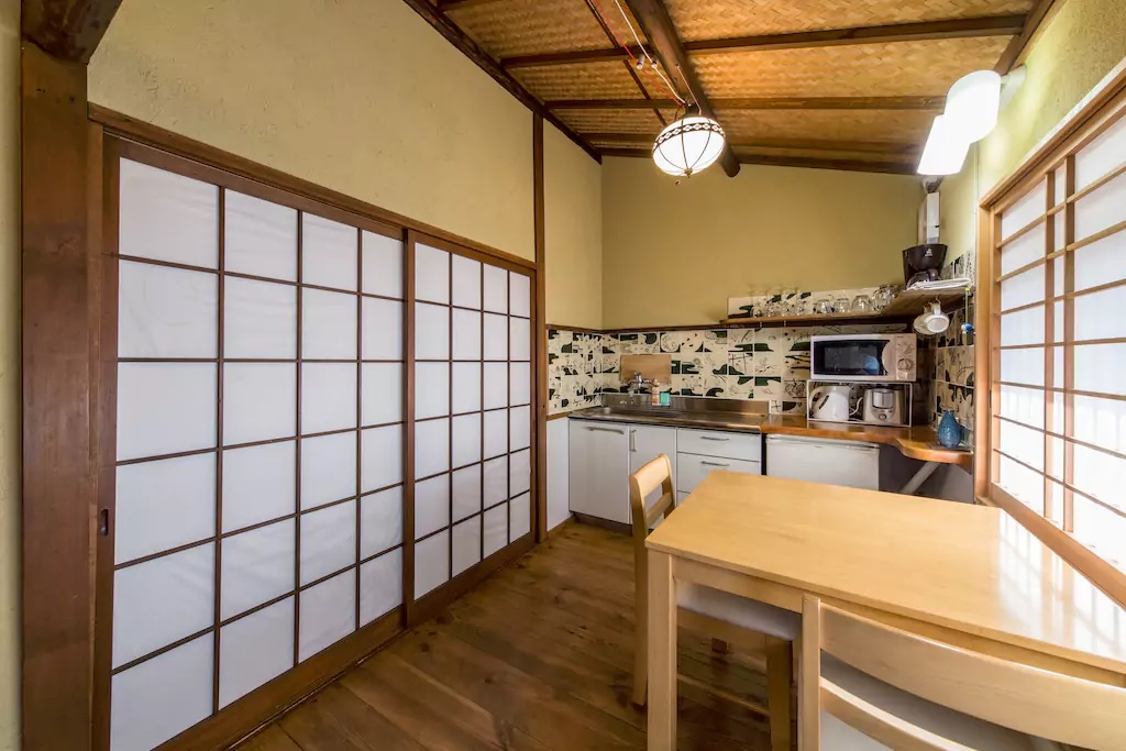 Cozy cottage kitchen with artistic patterned backsplash