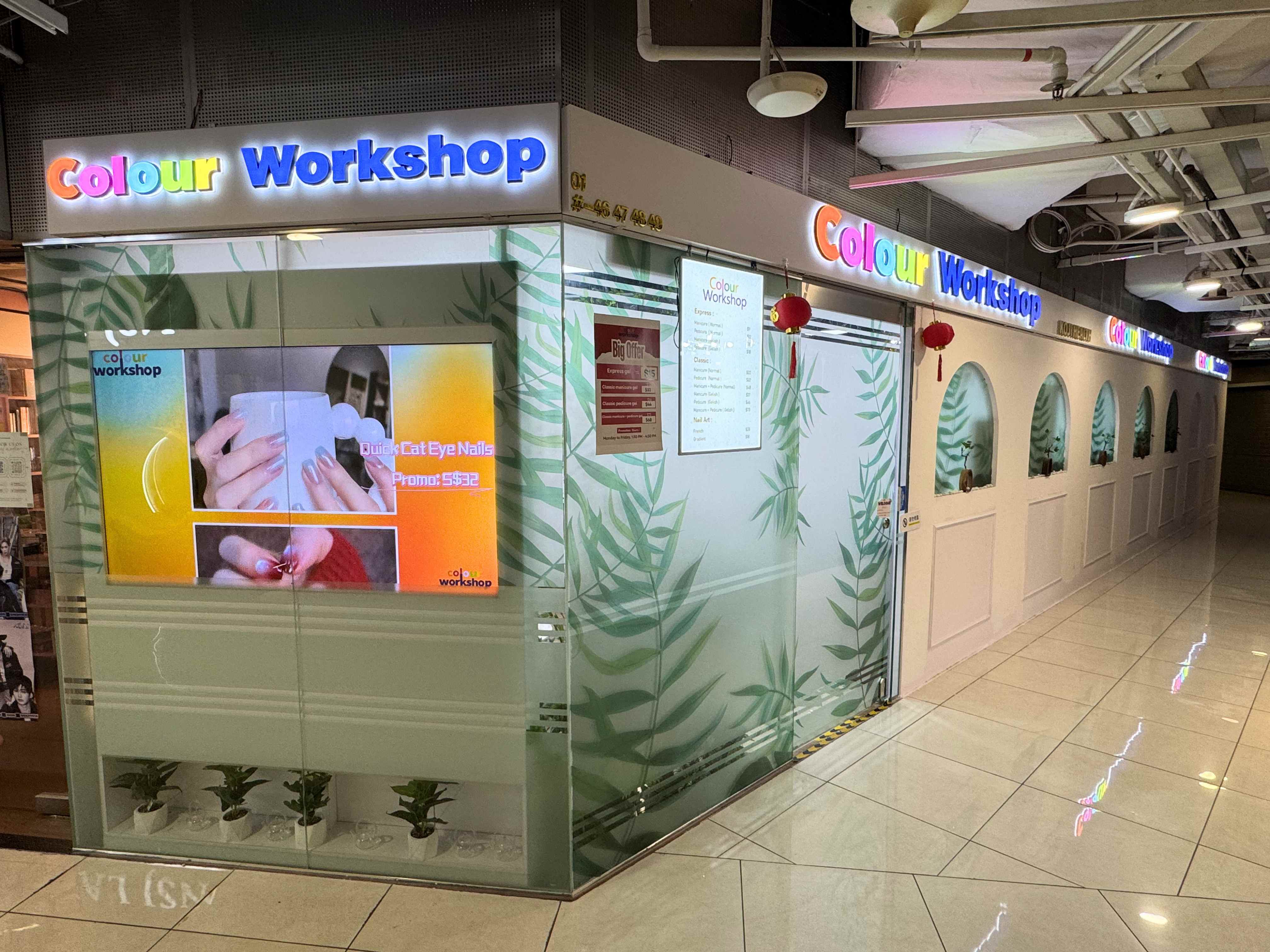 Colour Workshop nail salon storefront at Far East Plaza Singapore with botanical glass design