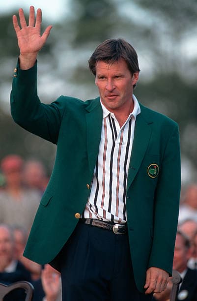 Sir Nick Faldo in green jacket at Masters ceremony