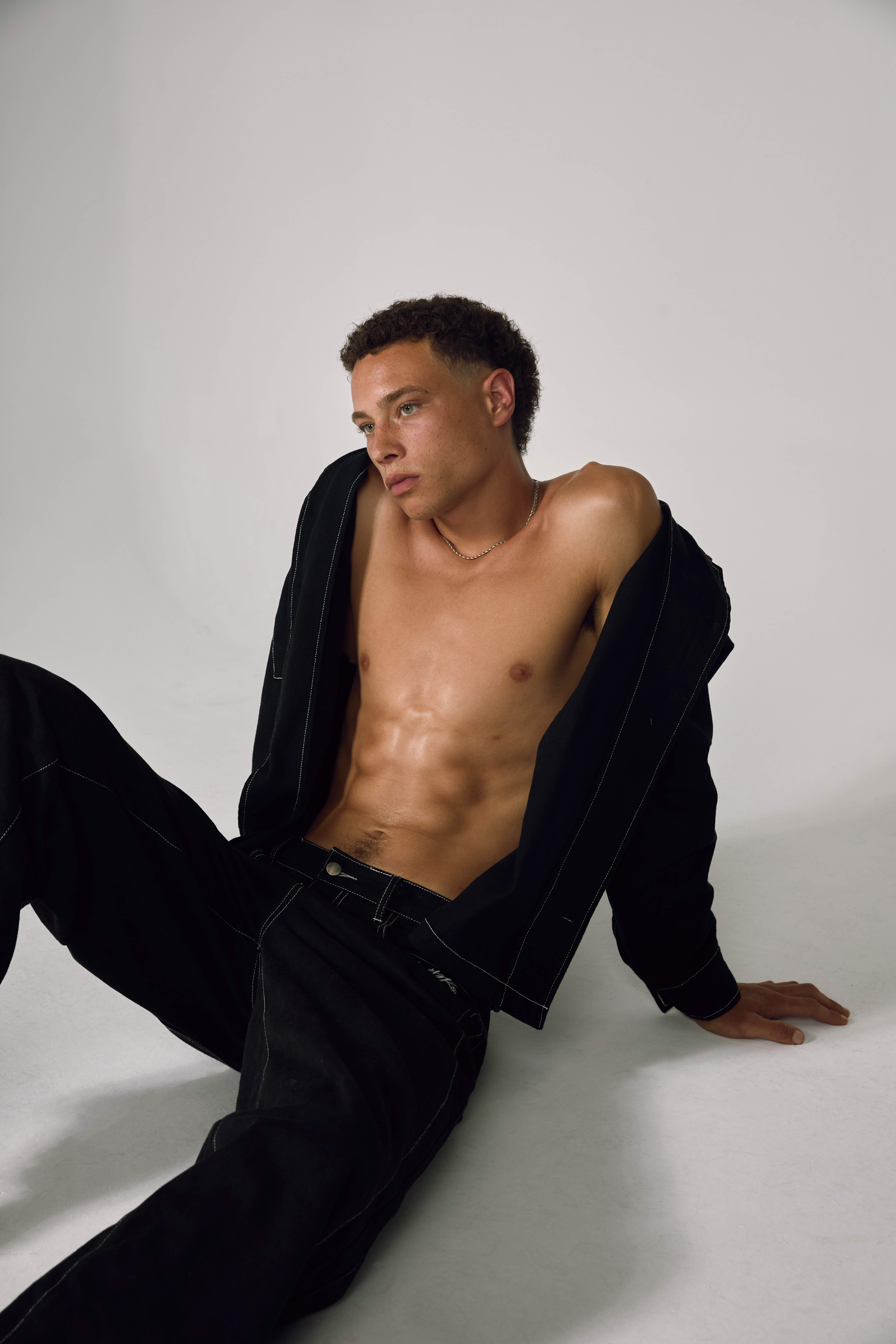 Skinny studio portrait in black