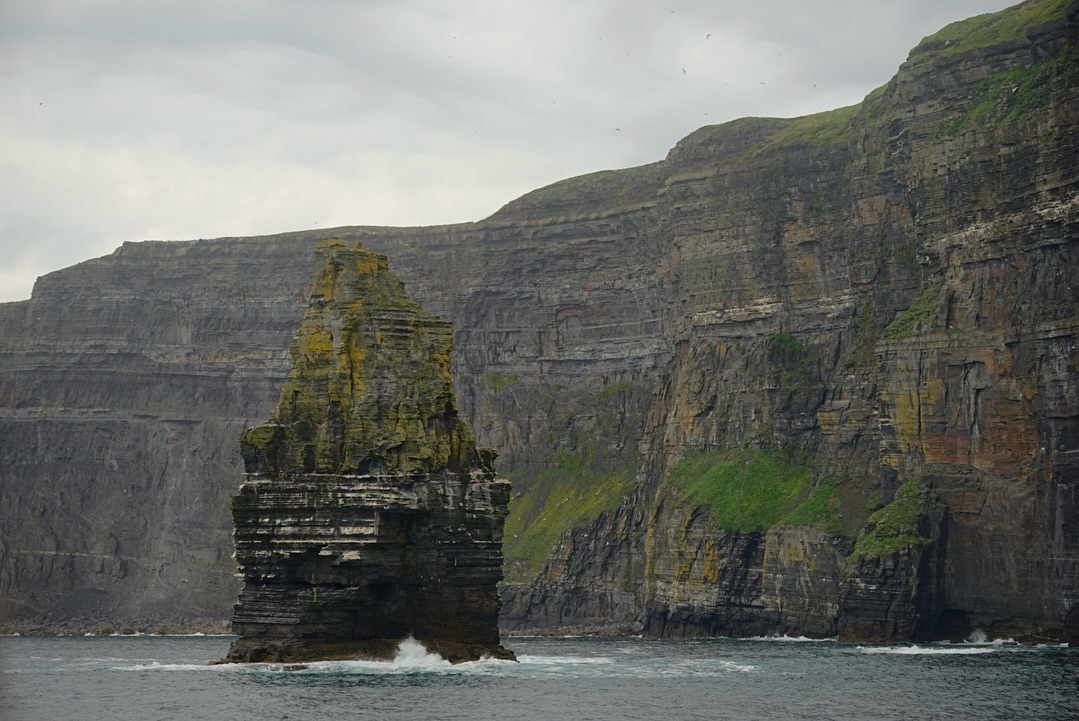 Cliffs of Moher sea stack rising from the Atlantic Ocean