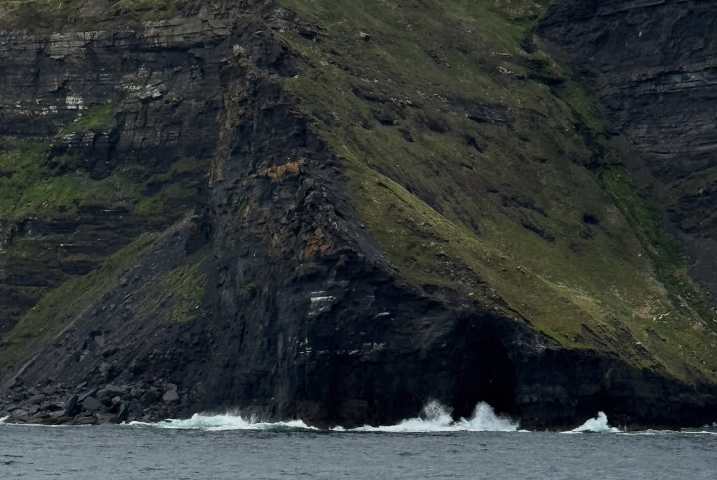 Irish coastal cliffs with crashing waves