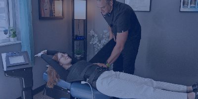 Patient receiving spinal decompression therapy treatment
