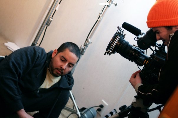 Danilo Santos and cinematographer reviewing the camera on the Taxy set