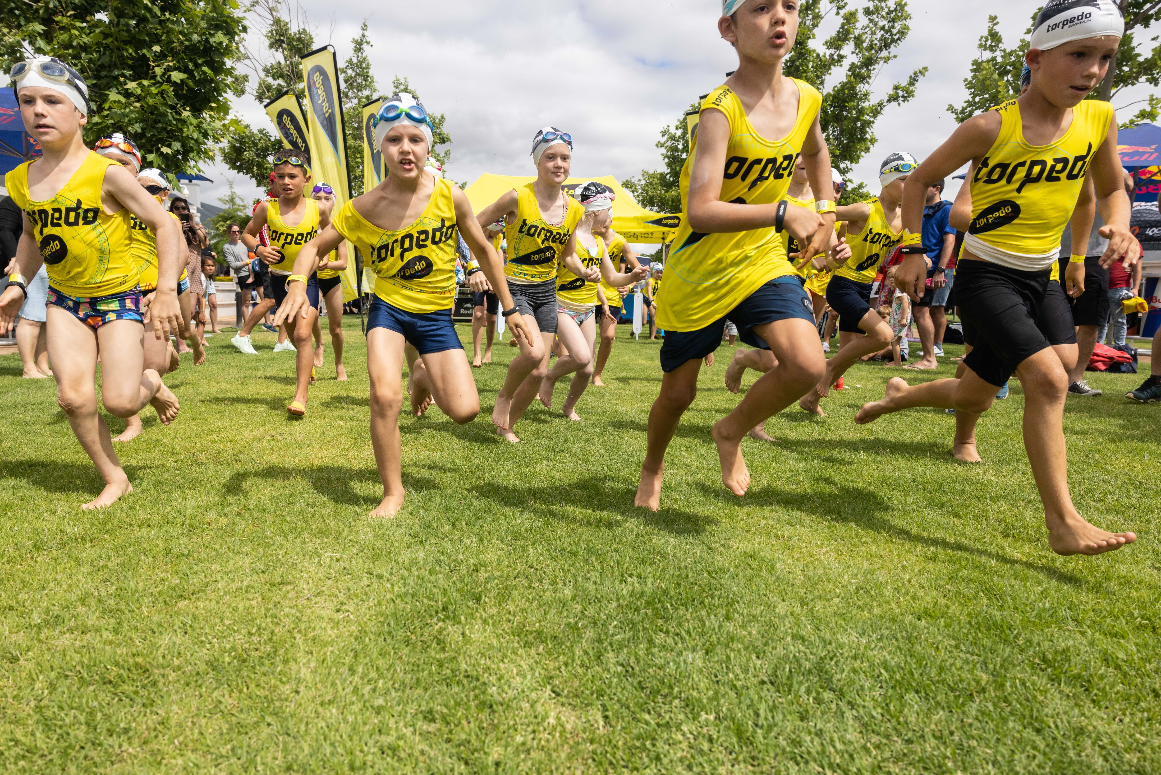 Kids running on grass