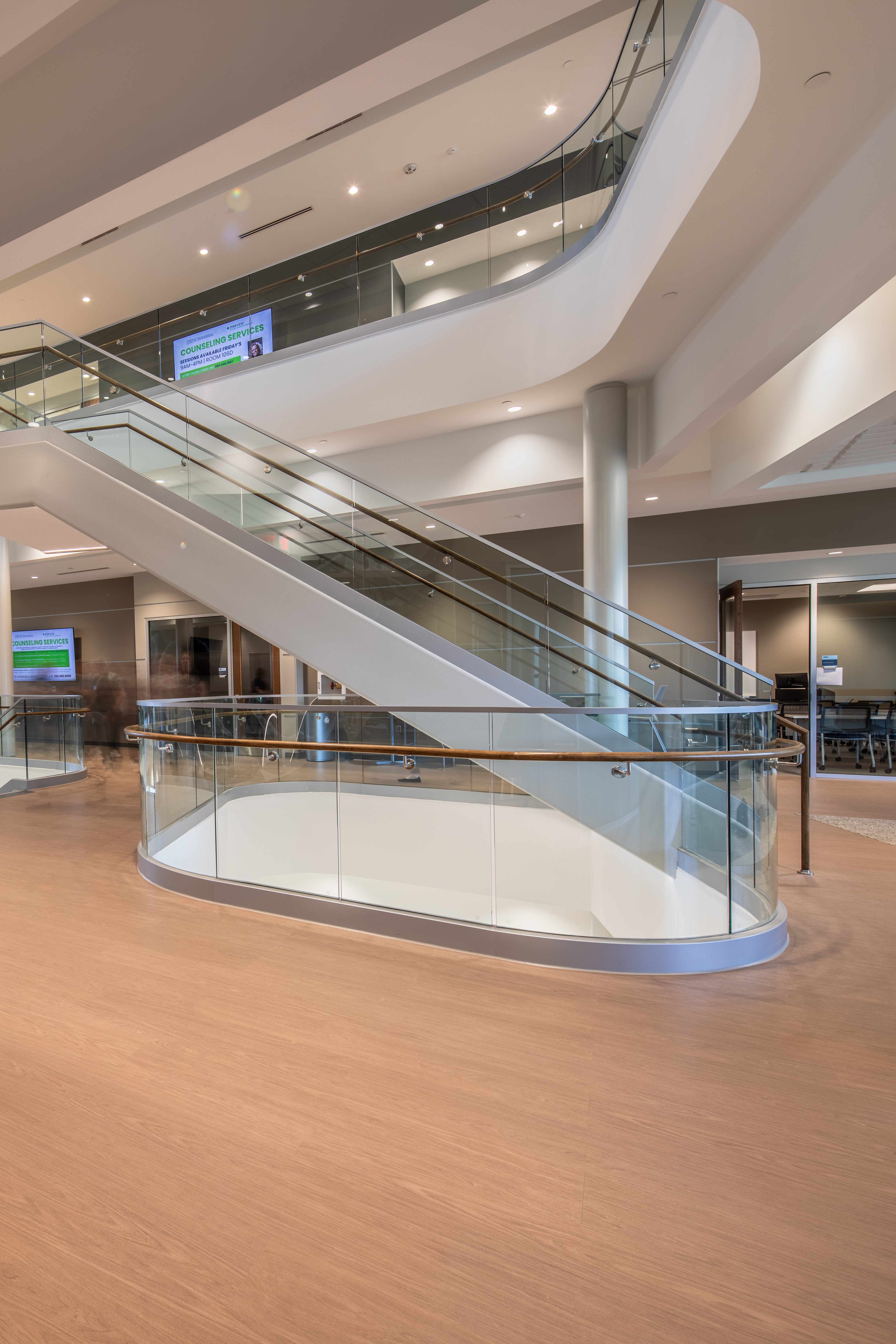 Trine University Health Professions Building — Structural Glass Curved Atrium Guardrail, Ground Floor
