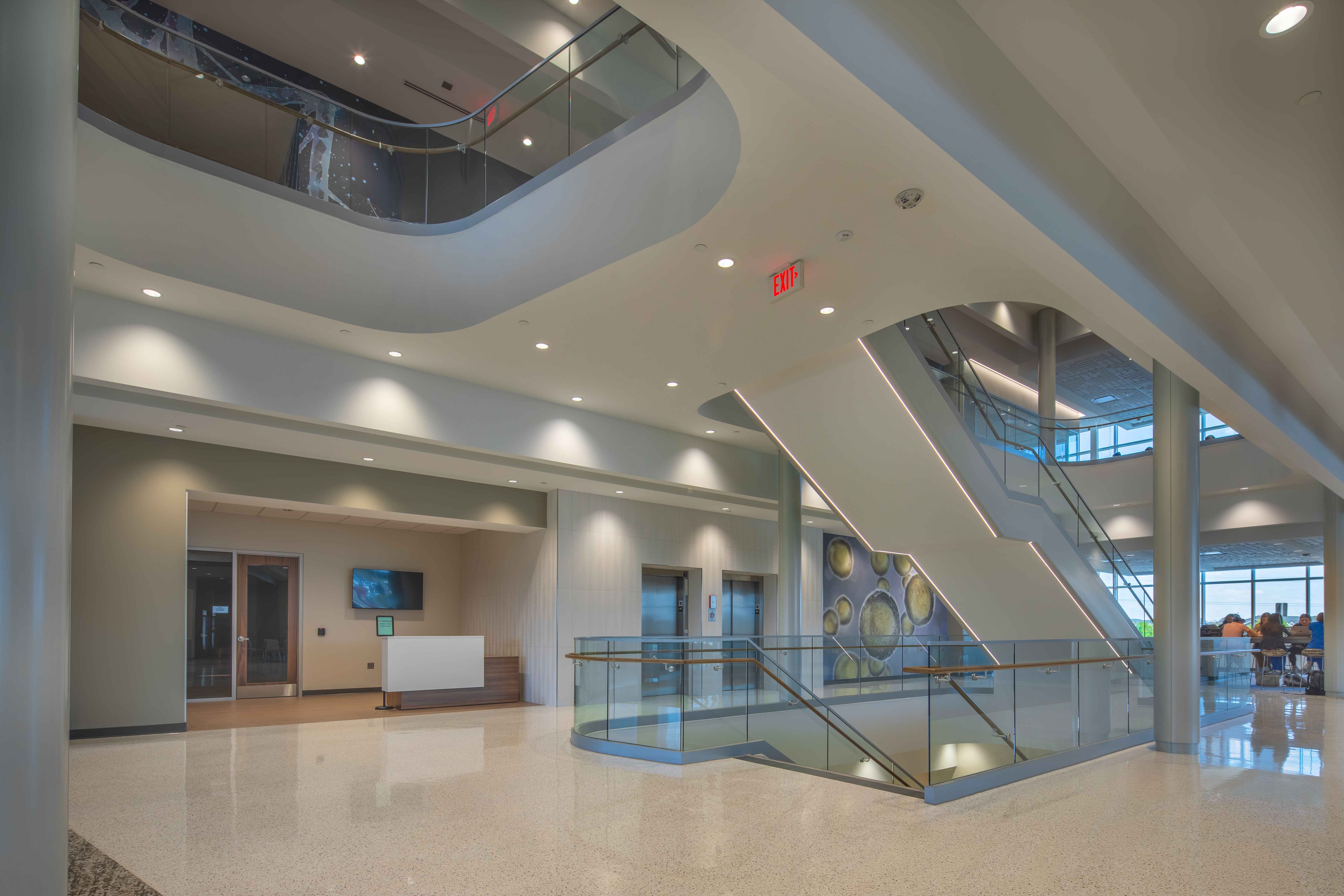 Trine University Health Professions Building — Structural Glass Stair & Cell Mural, Ground Floor Diagonal View