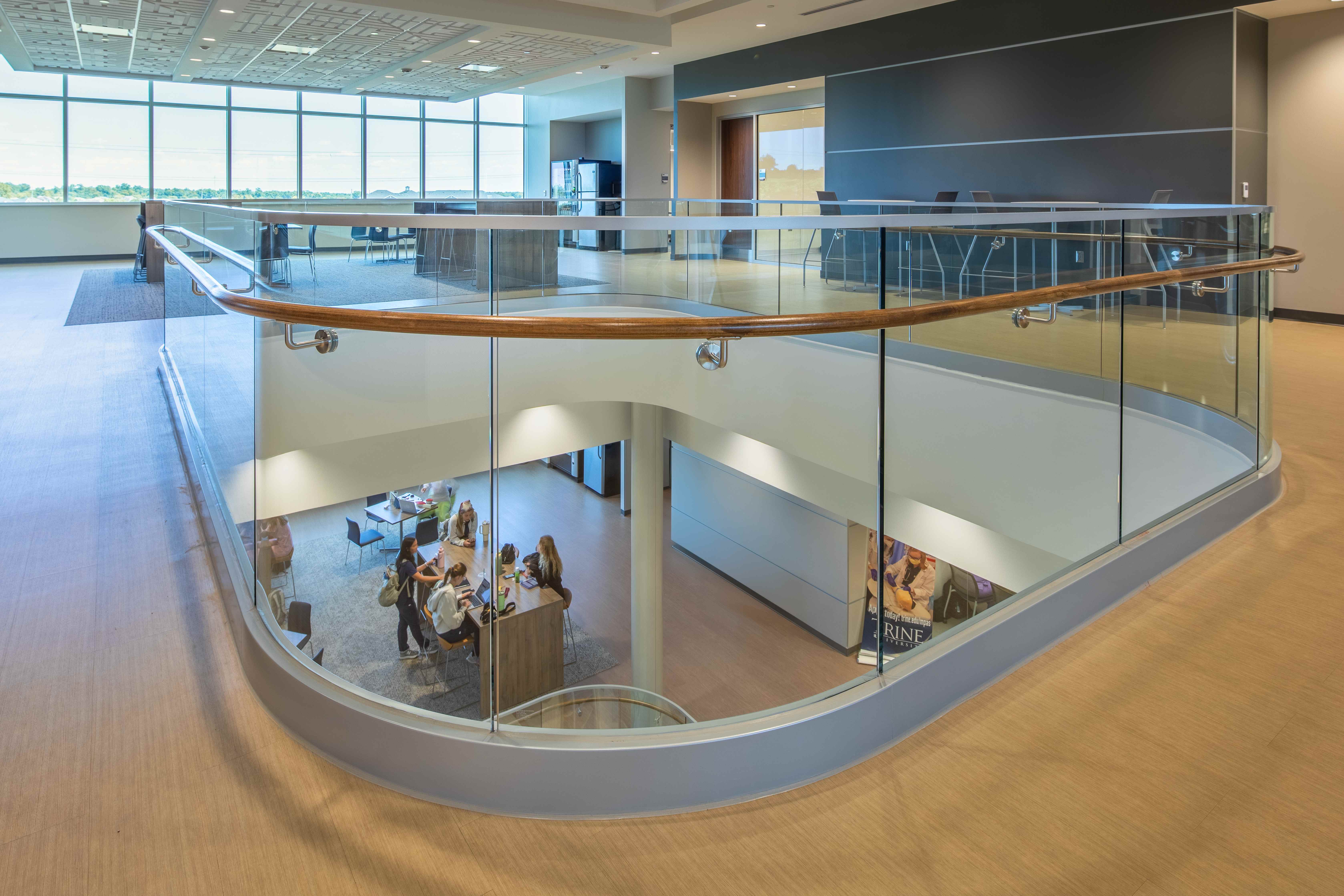 Trine University Health Professions Building — Structural Glass Atrium Guardrail with Students Below