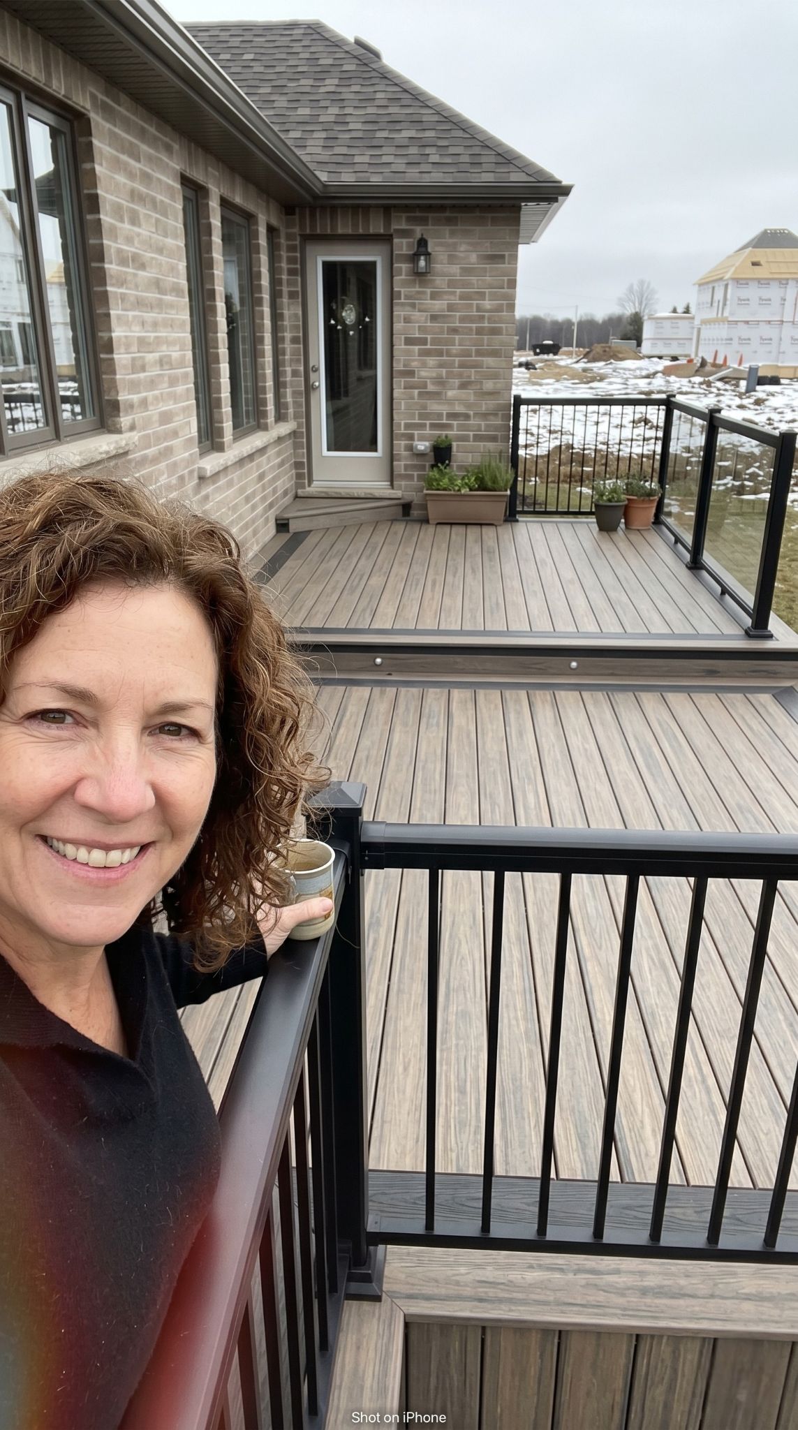 Susan M. with their new deck