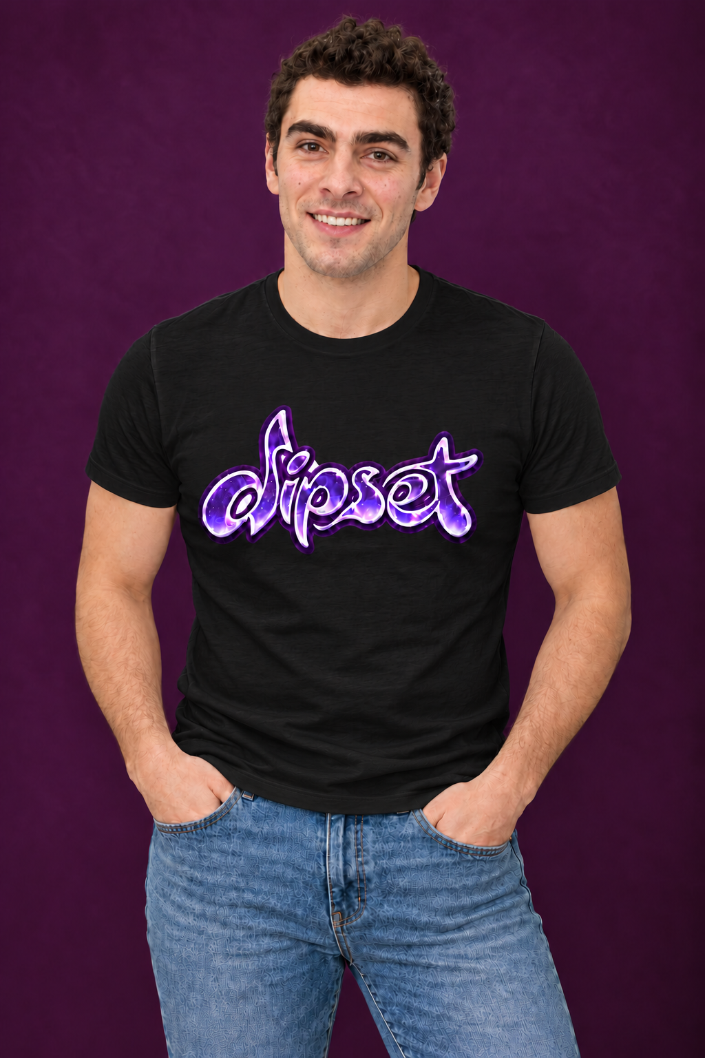 Smiling man with curly dark hair wearing a black Dipset T-shirt against a deep plum background