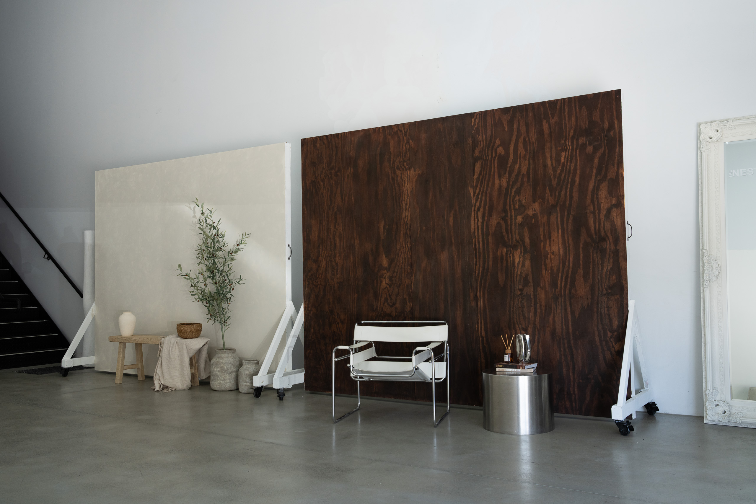 Studio backdrop panels with furniture and props