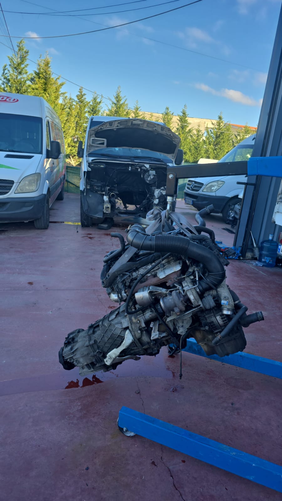 Engine Removal Process - Complete engine assembly being serviced