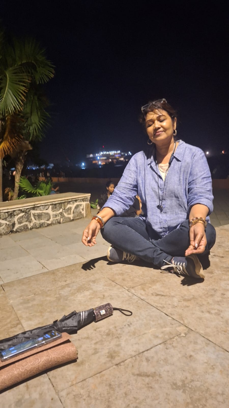 Deepshikha in peaceful meditation pose outdoors