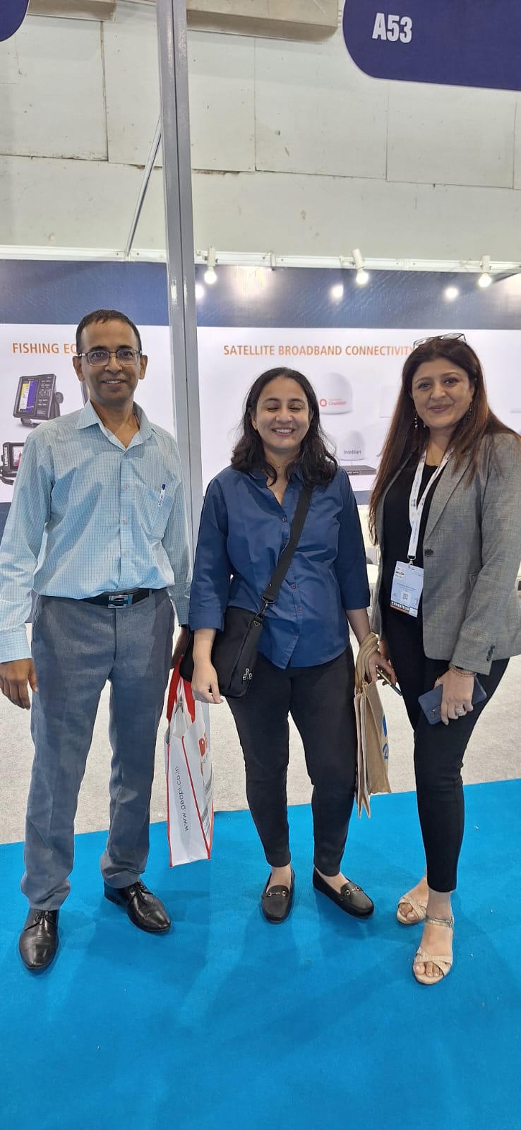 Deepshikha with colleagues at professional exhibition