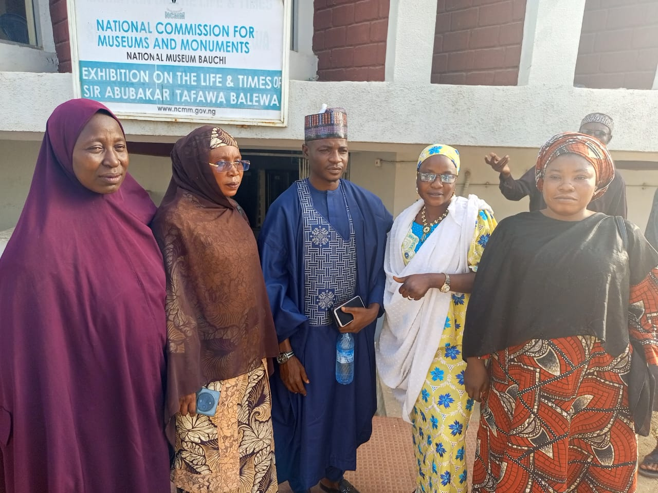 Women and community members gathered outside the National Museum in Bauchi.