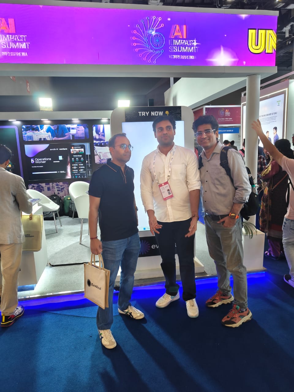 Team meeting visitors at the booth