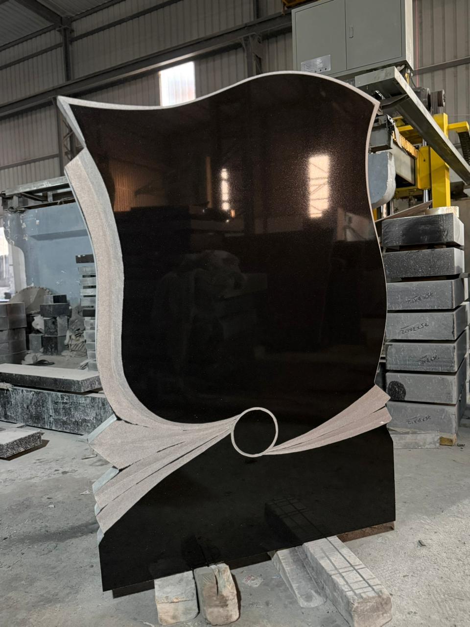 Sculptural granite monument piece