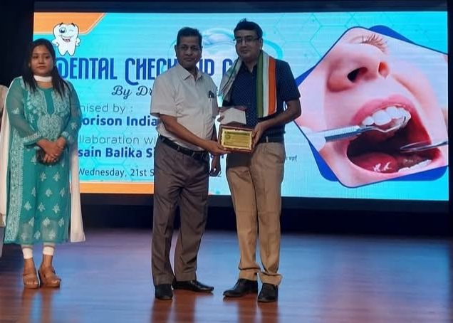 Award recognition - Dr. Bodhisatta Ghosh receiving trophy