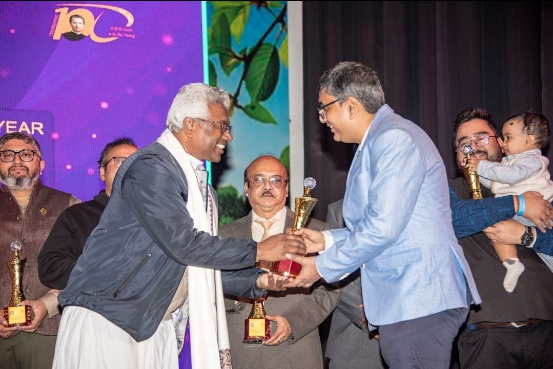 Award presentation ceremony - Dr. Bodhisatta Ghosh receiving trophy