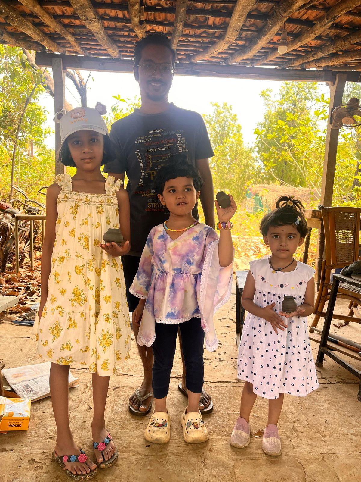 Workshop participants with their creations