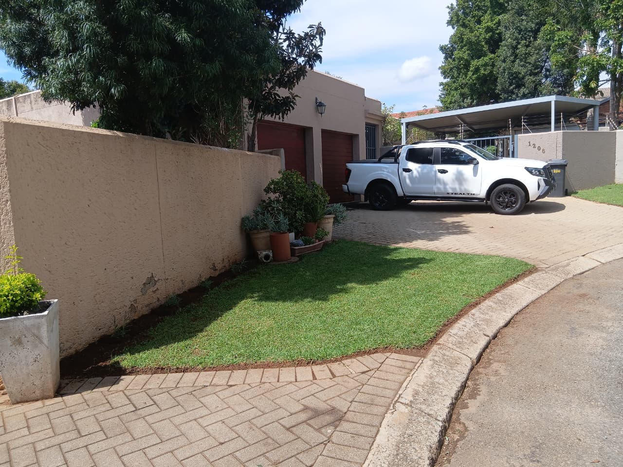 Neat residential lawn and driveway