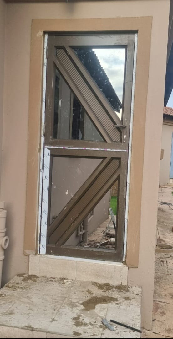 Decorative window with diagonal bars
